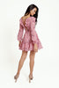 Floral pink mini dress, with a ruffled V-neckline, long lantern sleeves, a full, ruffled hemline and a sexy ruffled lace-up back.